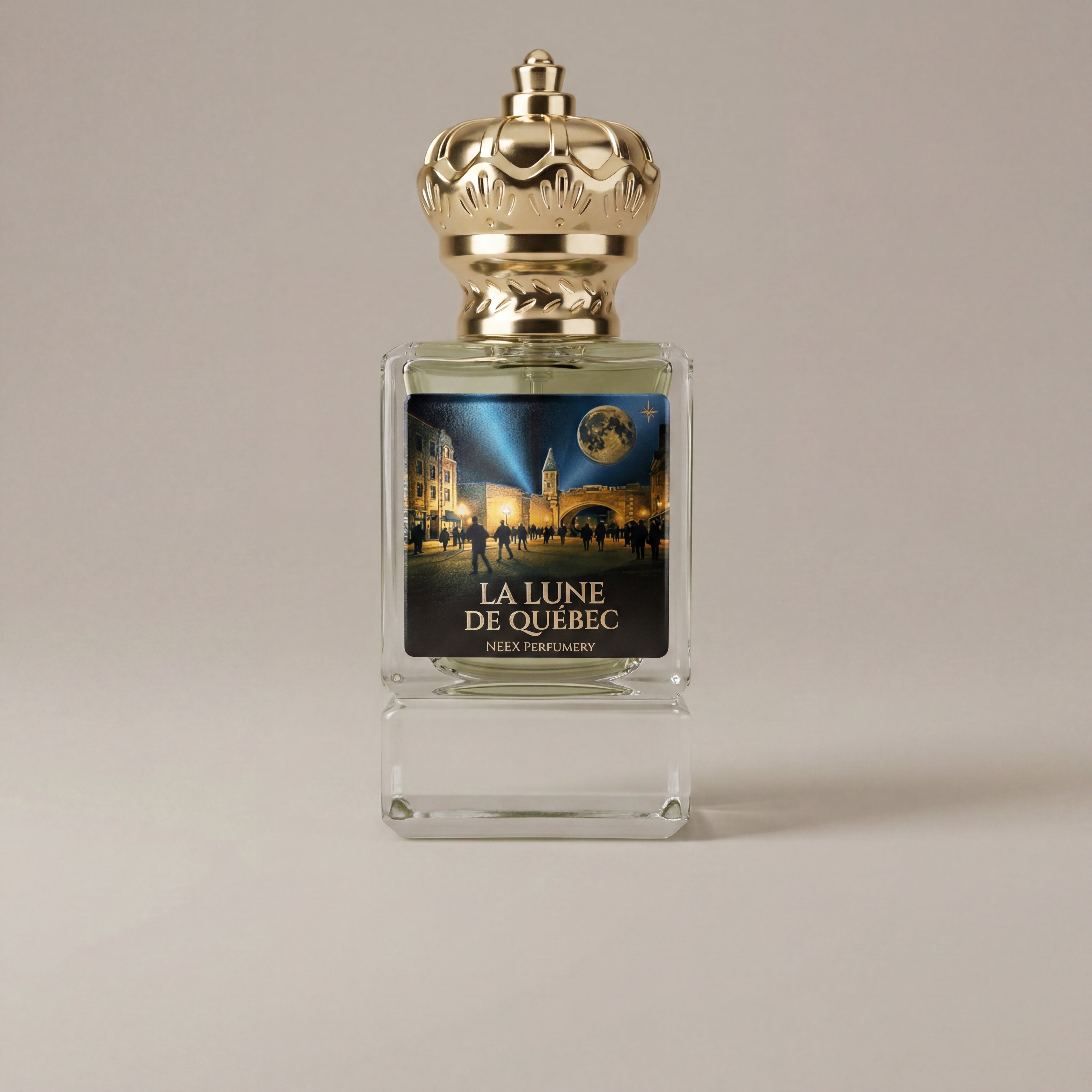 Perfume bottle labeled 'La Lune de Quebec' with a gold cap on a beige background