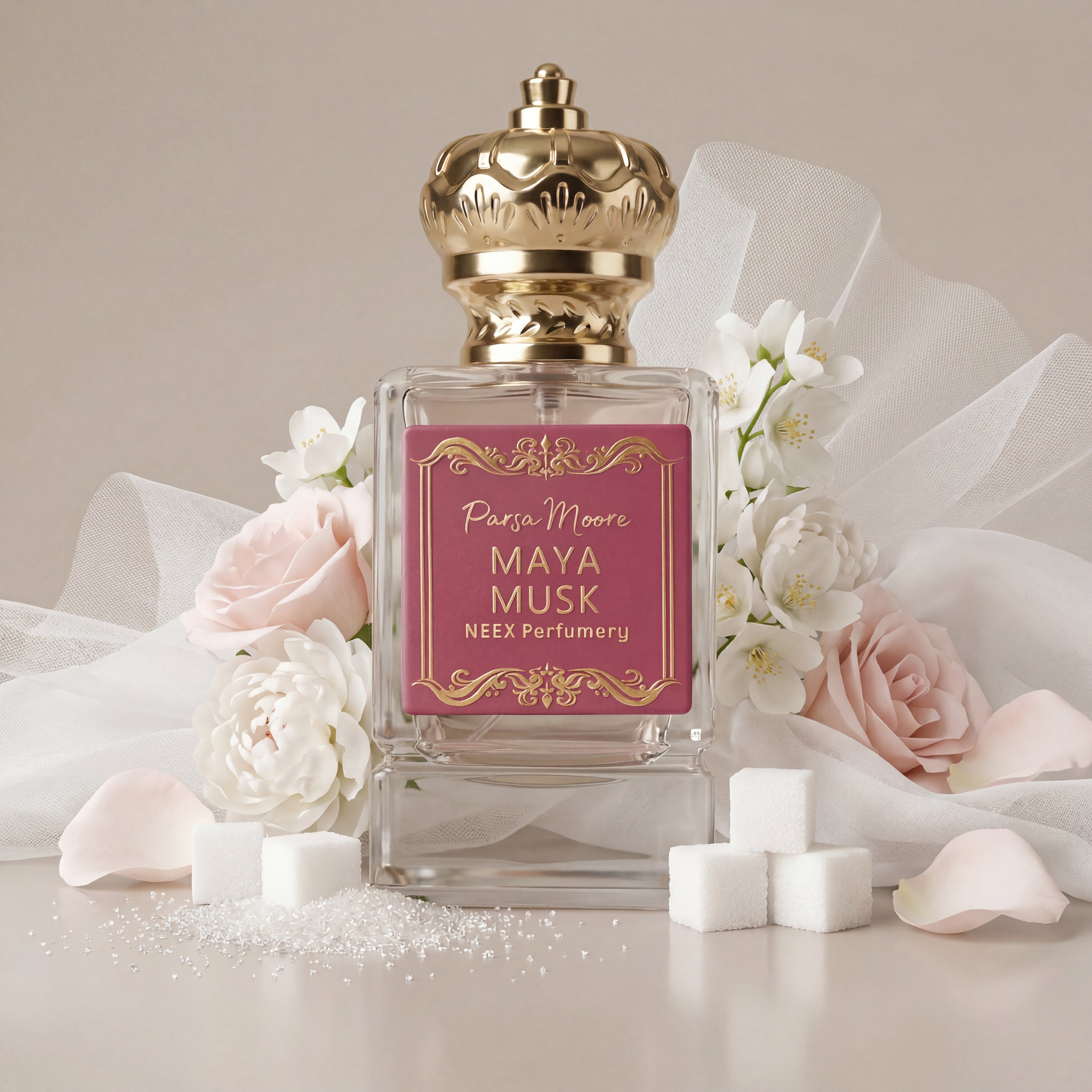 Perfume bottle labeled 'Maya Musk' by Parsa Moore with flowers and white fabric on a light background