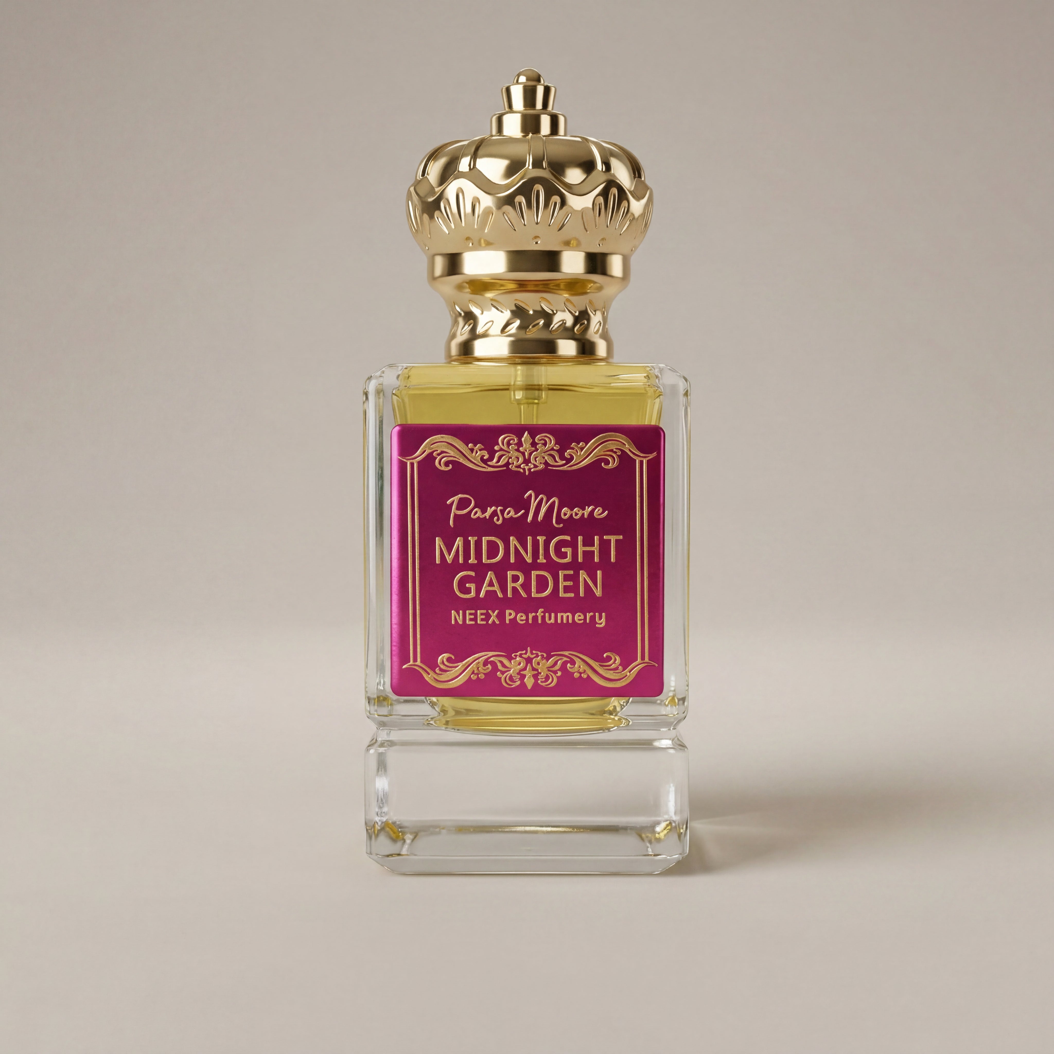 Perfume bottle with gold cap and pink label on a beige background