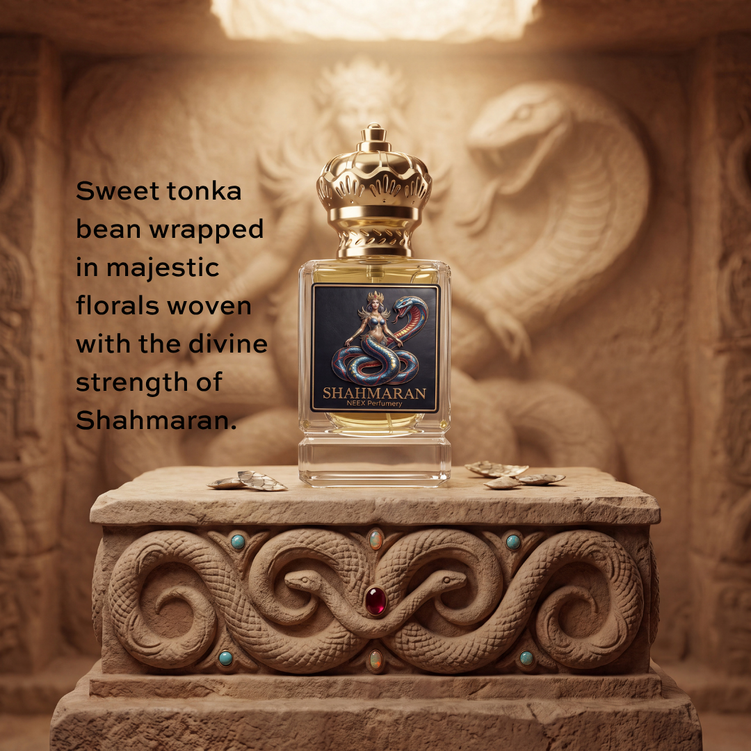 A perfume bottle labeled SHAHMARAN sits on a carved stone pedestal in a warm, ornate interior. The bottle has a gold-toned cap, clear glass, and golden liquid inside, with a dark blue front label featuring a snake illustration.