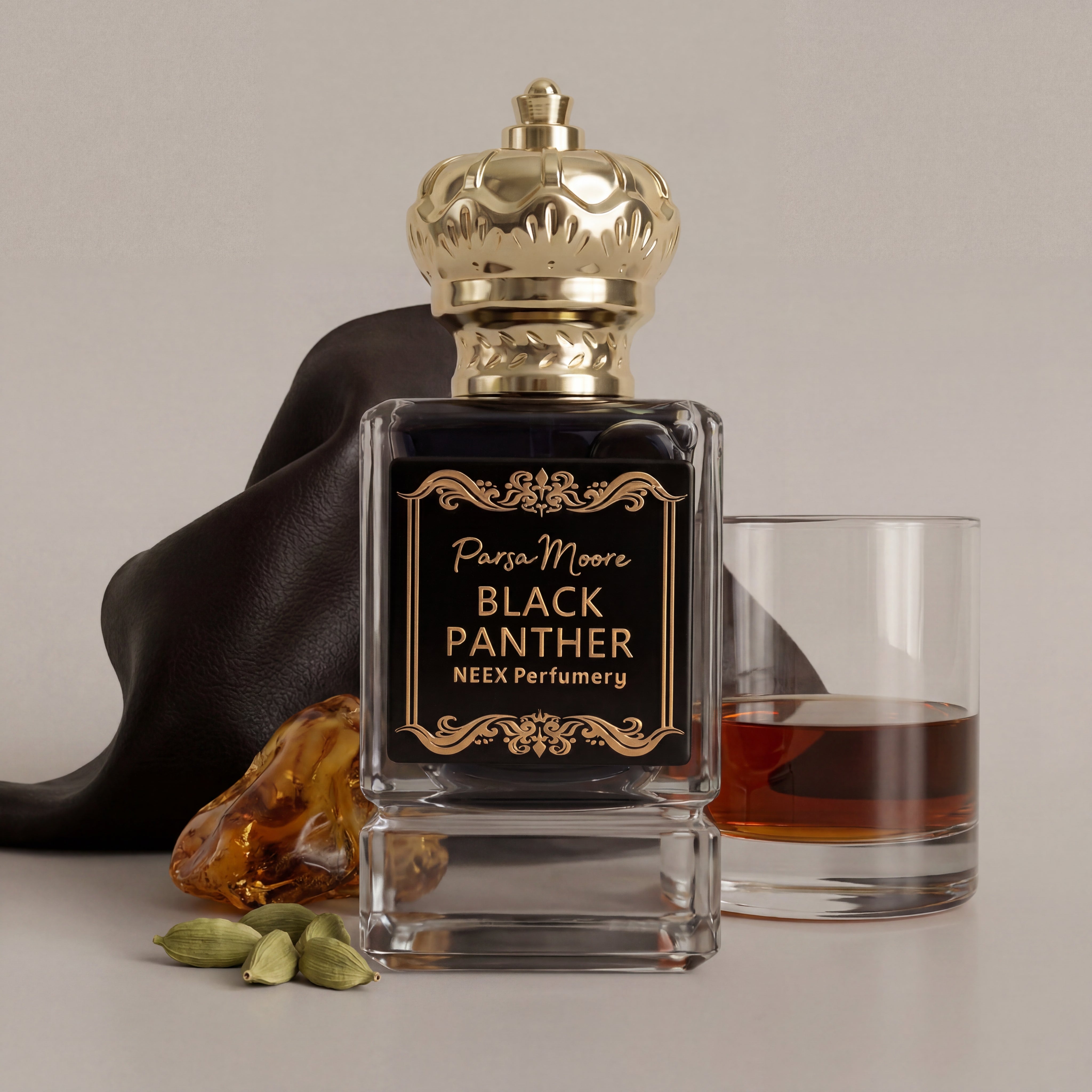 Perfume bottle labeled 'Black Panther' by Para Moore with a glass of liquid and spices on a neutral background