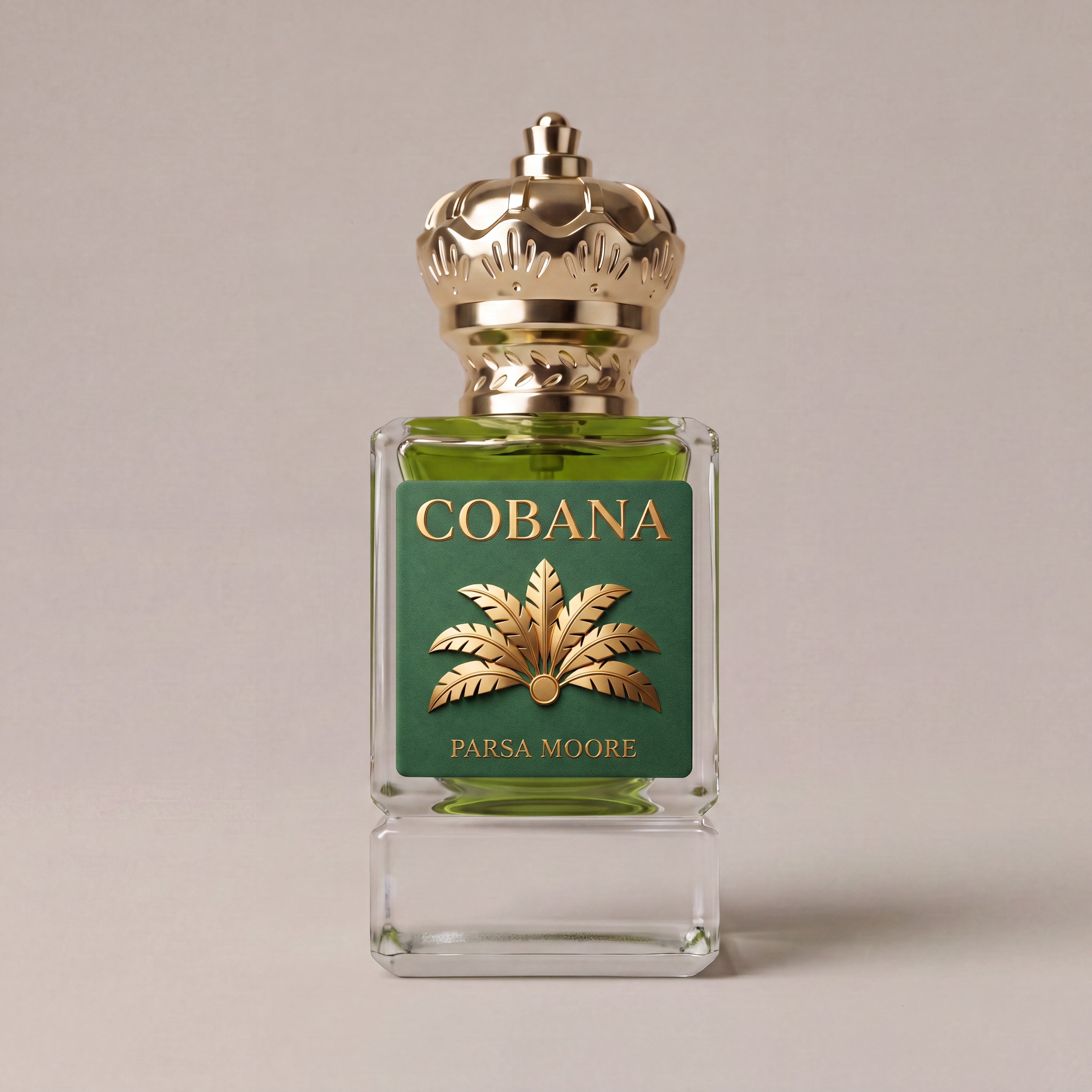 A square glass perfume bottle with green liquid, a dark green label featuring gold lettering and a gold palm leaf, and an ornate gold cap, centered on a warm beige background. The label reads 'COBANA' and 'PARSA MOORE'.