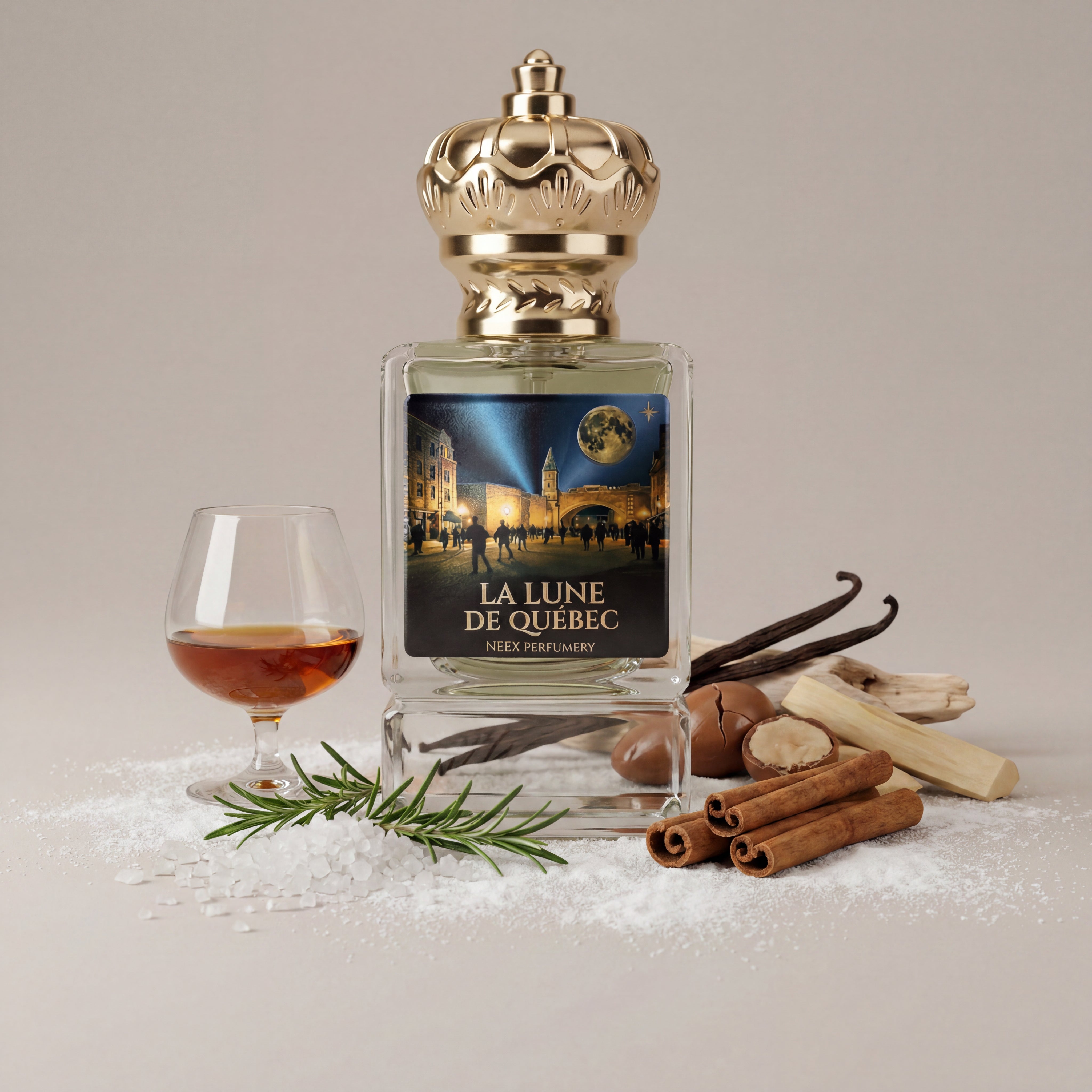 A perfume bottle labeled 'LA LUNE DE QUEBEC' by NEEX PERFUMERY, styled with a glass of amber liquor, vanilla beans, cinnamon sticks, a sprig of rosemary, and nutmeg on a light beige background.