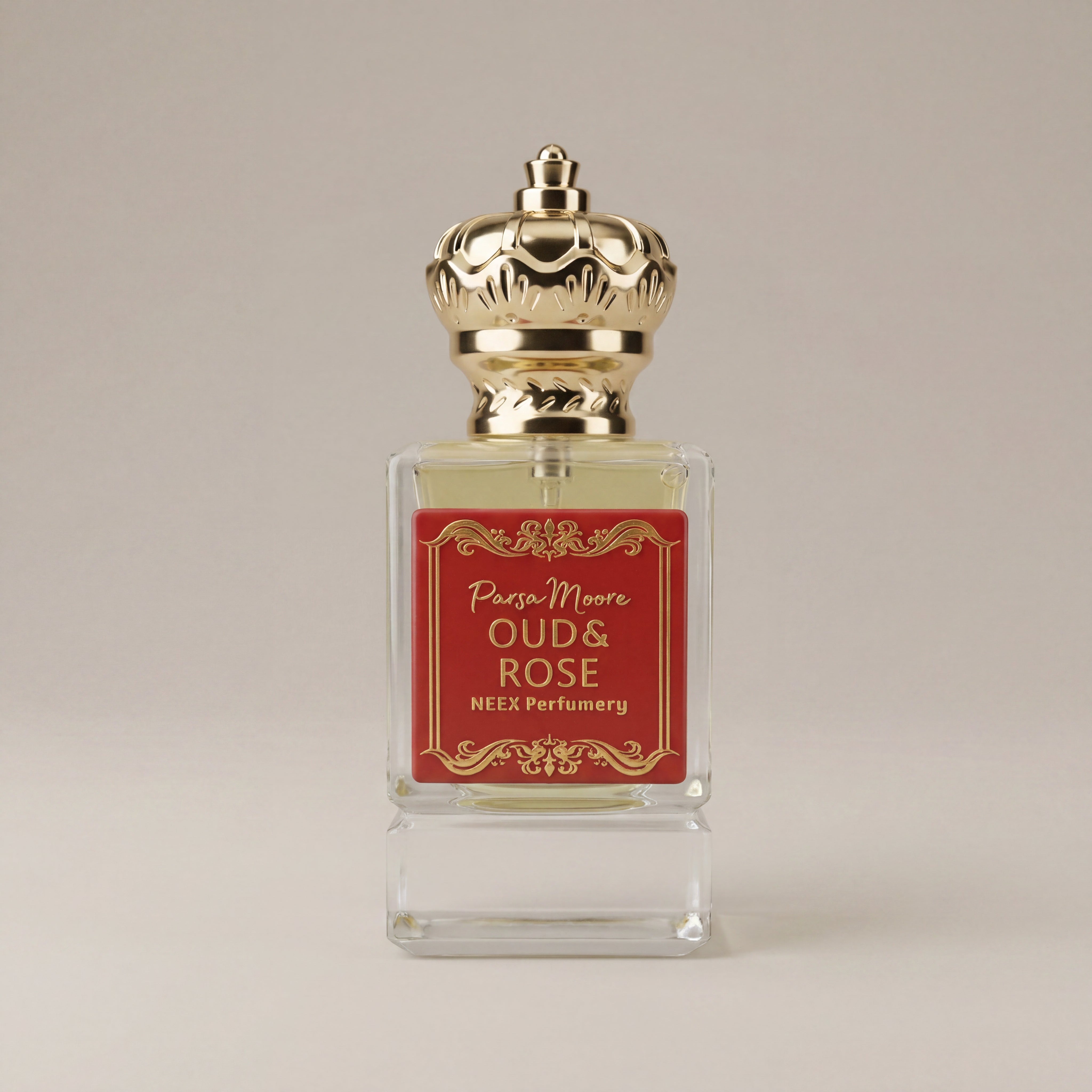 Perfume bottle with gold cap and red label on a beige background