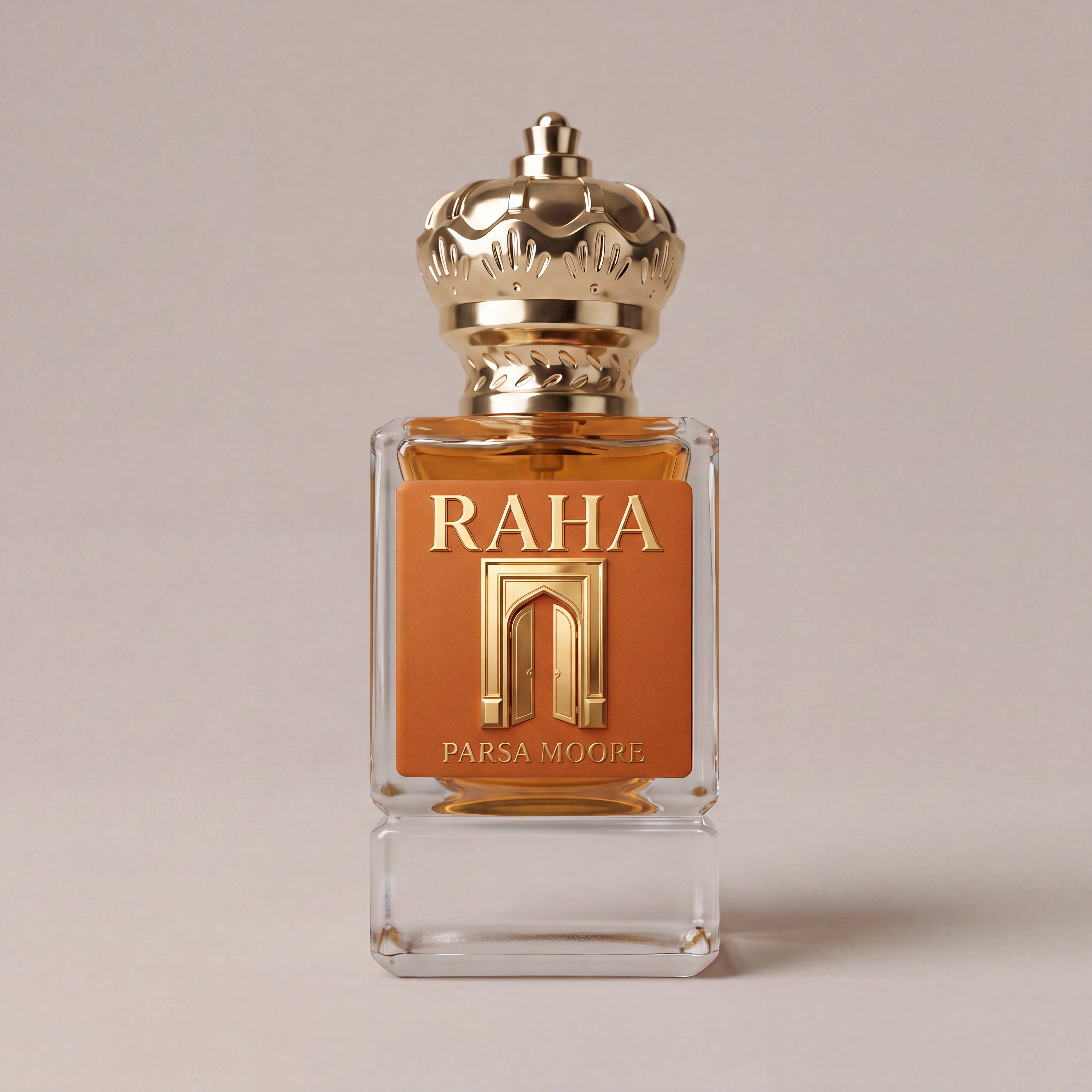 A rectangular glass perfume bottle with a gold crown cap, filled with amber liquid and featuring a gold front label that reads 'RAHA' and 'PARSA MOORE' on a warm beige background.