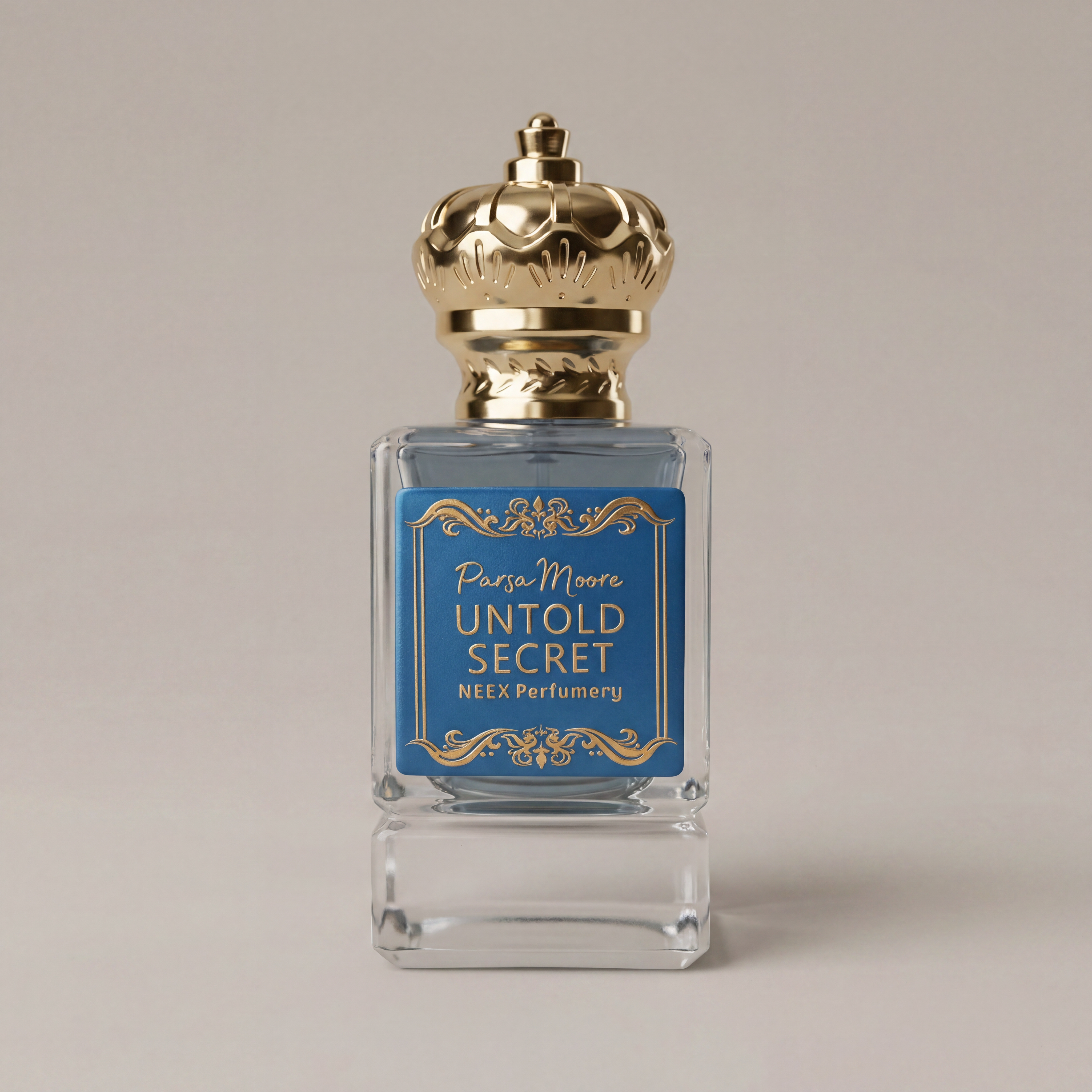 Perfume bottle with gold cap and blue label on a beige background