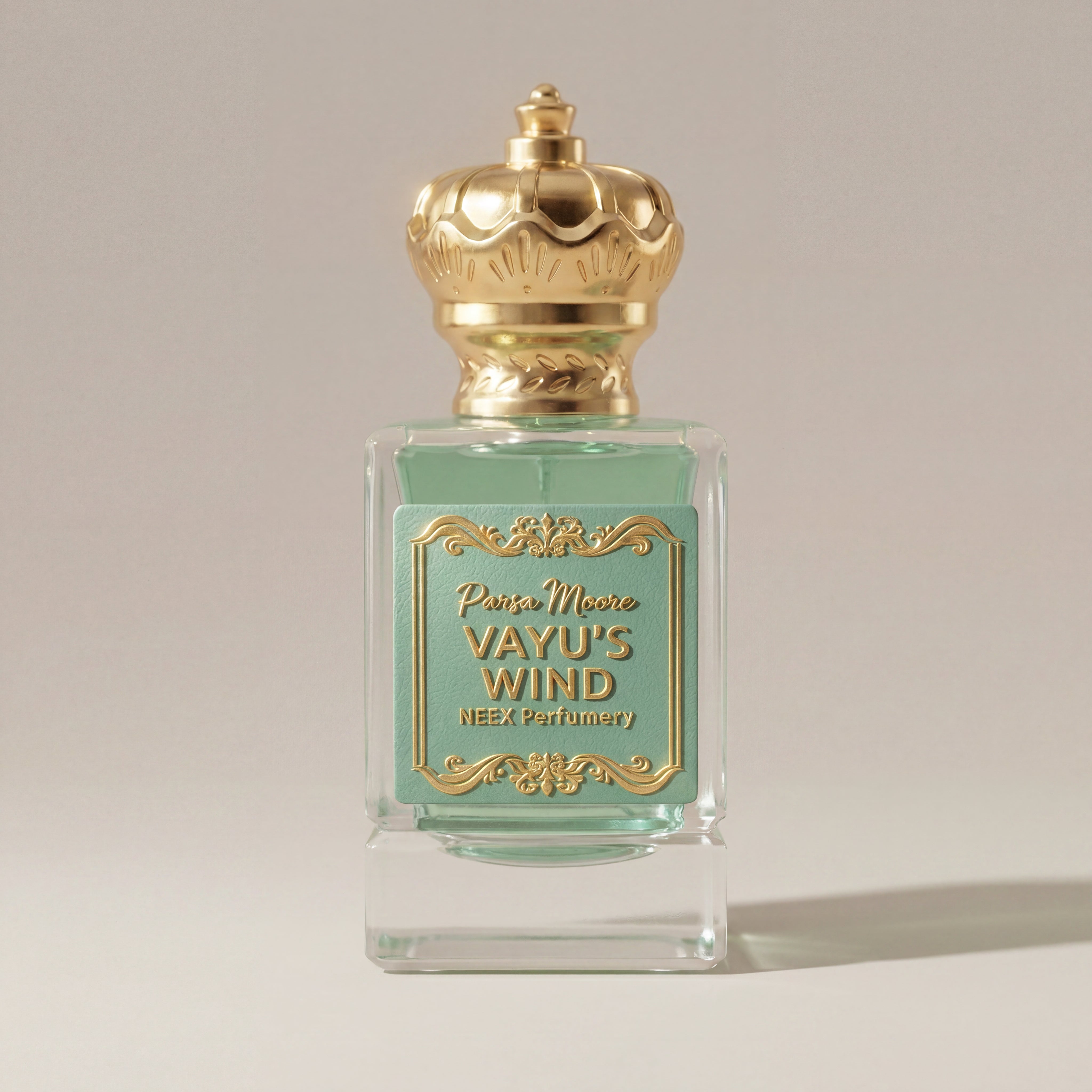 Perfume bottle with gold cap and label on a light gray background